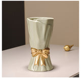 Green Elegant Ceramic Vase with Golden Bow Accent - Textured Relief Flower Holder for Living Room & Dining Table Decor - 45-Degree Angle