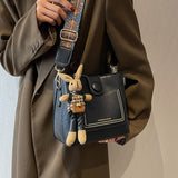 Vintage Style PU Leather Bucket Bag with Wide Patterned Strap & Optional Bunny Charm(black) - Side View