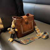 Vintage Style PU Leather Bucket Bag with Wide Patterned Strap & Optional Bunny Charm(red brown) - Top-Down View