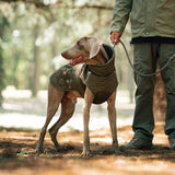 Size S Olive Green Warm Quilted Dog Winter Coat - Adjustable Fleece-Lined Puffer Vest with Reflective Trim & Leash Port - Side View