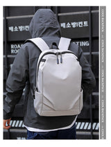Black Modern Anti-Theft Laptop Backpack with USB Charging Port - Water-Repellent Travel & Business Bag for 15.6 Inch Laptops - Low Angle