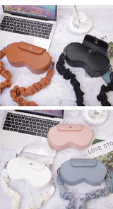 Pink Chic PU Leather Crossbody Storage Bag for Apple AirPods Max - Protective Case with Ruched Fabric Strap & Top Handle - Close-Up Angle