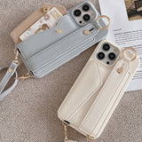 Black Chic PU Leather Crossbody Wallet Case for iPhone 16 - Card Holder with Detachable Strap & Finger Ring Grip - Rear View