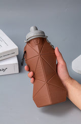 White and Grey Cup Lid Ultimate Foldable Silicone Water Bottle - Lightweight Leakproof Travel & Sports Hydration - 700ml - 45-Degree Angle