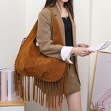 Brown Boho Chic Fringed Hobo Bag - Large Capacity Soft Faux Suede Shoulder Tote with Tassel Detail - Top-Down View