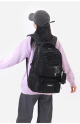 Black Large Capacity Student Backpack - Durable Oxford Cloth School Bag with Laptop Compartment & Multiple Pockets - Front View