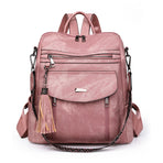 Pink women's PU leather convertible backpack with tassel charm