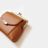 Brown Vintage Style Women's Kiss Lock Coin Purse - Compact PU Leather Wallet with Card Holder - Top-Down View
