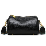 Black Vintage Embossed Crossbody Barrel Bag with Wide Adjustable Guitar Strap