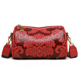 Red Vintage Embossed Crossbody Barrel Bag with Wide Adjustable Guitar Strap
