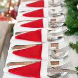 Mini Santa Hat Cutlery Holders (100-Pack) - Festive Christmas Wine Bottle Toppers & Table Decorations - Front View