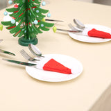 Mini Santa Hat Cutlery Holders (100-Pack) - Festive Christmas Wine Bottle Toppers & Table Decorations - Top-Down View