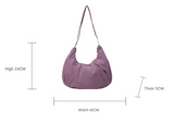 Blue Lightweight Crescent Crossbody Bag - Slouchy Nylon Hobo Purse for Casual Everyday Use - Front View