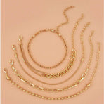 A golden six-piece set Chic Multi-Layered Alloy Bracelet Set - Fashionable Stackable Jewelry