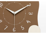 Abstract Modern Wall Clock - Silent Non-Ticking Decorative Clock with Wavy Design & Ceramic Accent(green) - Top-Down View