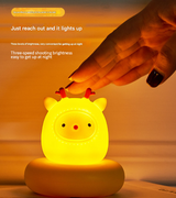 Red and White Snowman Cute Animal LED Night Light - Rechargeable Silicone Nursery Lamp with Tap Control, Dimmable Bedside Light for Kids - Top-Down View