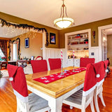Red Festive Santa Hat Dining Chair Covers - Set of 8 for Holiday Party Decoration - Low Angle