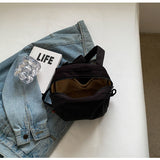 Black Lightweight Canvas Crossbody Bag - Minimalist Casual Shoulder Satchel with Adjustable Strap - Close-Up Angle