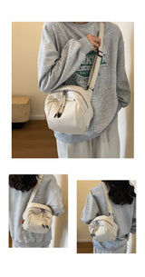 White Lightweight Canvas Crossbody Bag - Minimalist Casual Shoulder Satchel with Adjustable Strap - Front View