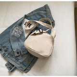 White Lightweight Canvas Crossbody Bag - Minimalist Casual Shoulder Satchel with Adjustable Strap - 45-Degree Angle