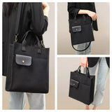 Black Unisex Canvas Tote Bag - Structured Vertical Shoulder Satchel with Front Pocket - Lightweight Crossbody for Work, Uni & Daily Commute - Front View