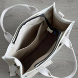 Black Unisex Canvas Tote Bag - Structured Vertical Shoulder Satchel with Front Pocket - Lightweight Crossbody for Work, Uni & Daily Commute - Top-Down View