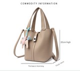 Beige Women's Small PU Leather Bucket Bag with Secure Lock and Horse Charm - 20cm Compact Crossbody Handbag for Everyday Use - Front View