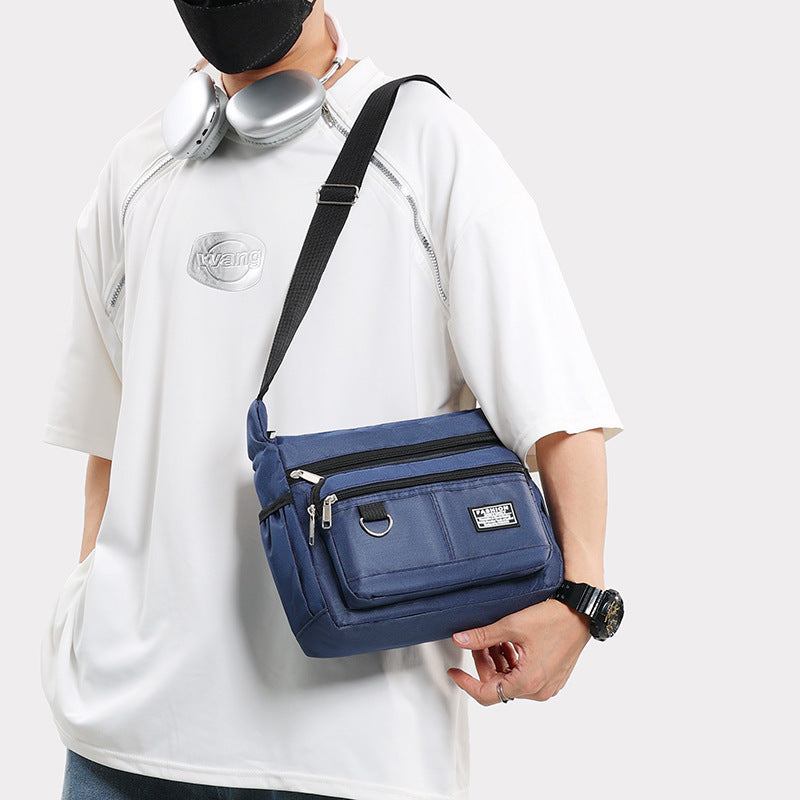 Dark Blue Men's Waterproof Oxford Cloth Crossbody Bag - Durable Anti-Theft Shoulder Backpack for Business, Travel & 10-inch Tablet
