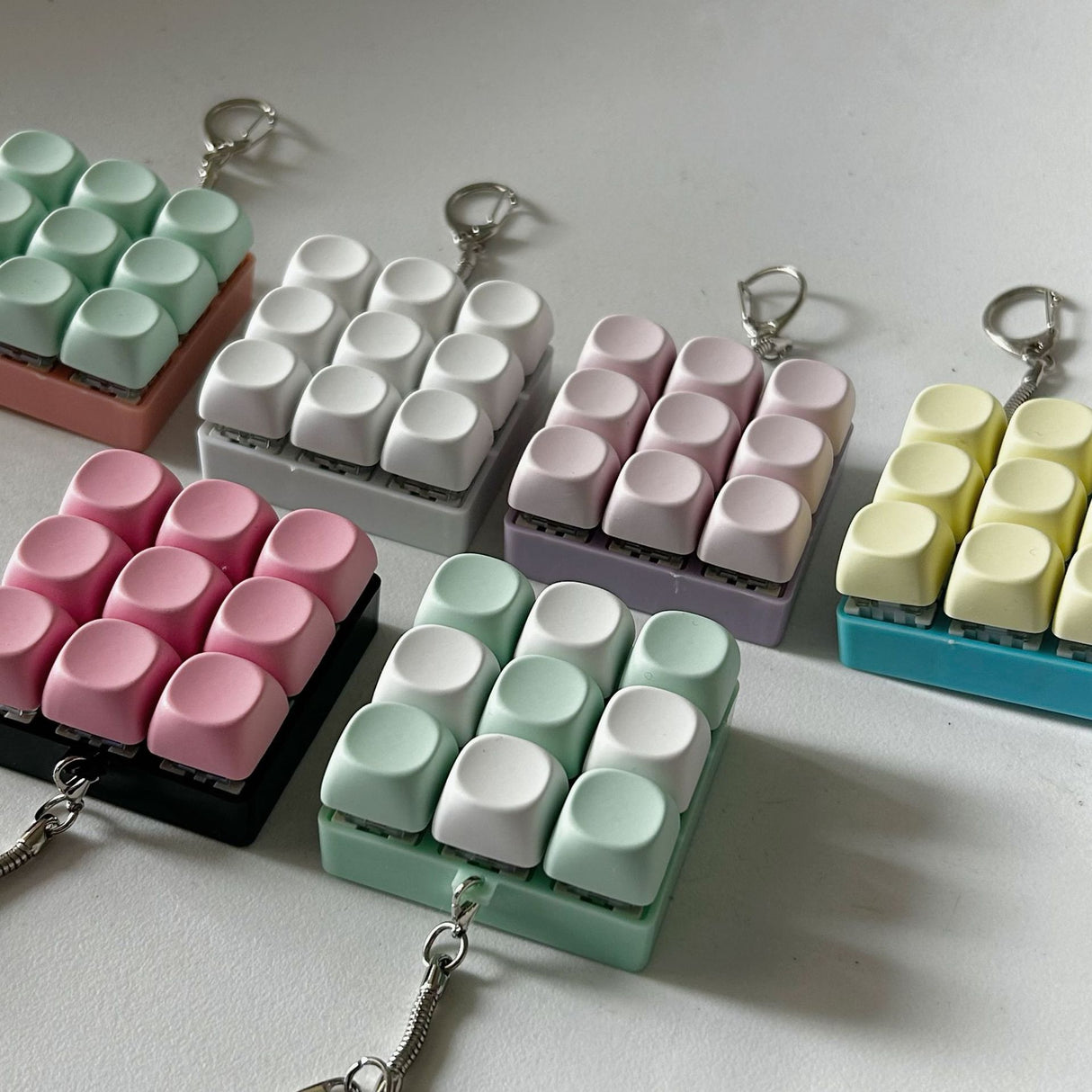 2-Pack Light Yellow Mechanical 9-Keyboard Fingertip Toy Keychain - Key Pressure Relief, PVC Fingertip Toy