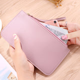 Light blue Women's Soft PU Leather Double-Layer Zip Wallet with Wrist Strap – Spacious Card, Cash and Phone Holder for Students and Everyday Use in Australia - Front View