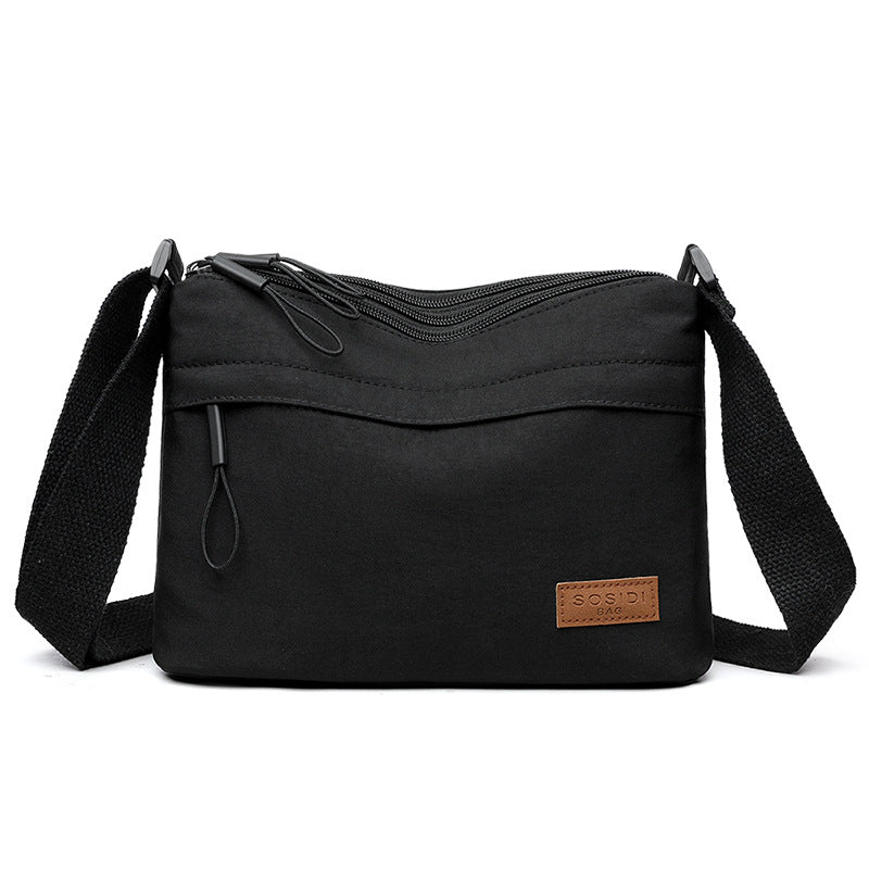 Black Women Lightweight Nylon Crossbody Bag with Multiple Pockets Compact Shoulder Bag for Travel and Daily Essentials in Australia