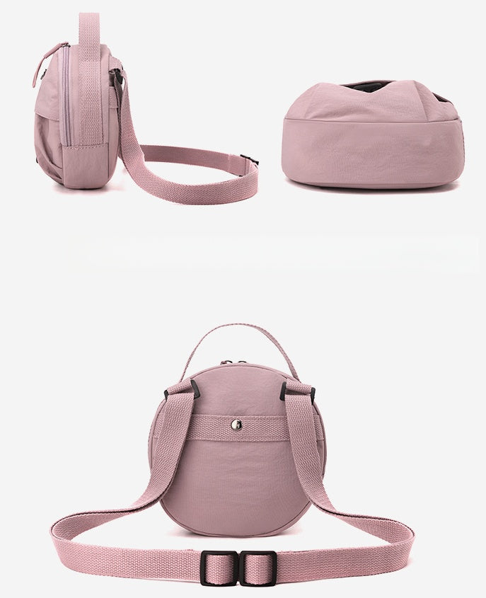 Orange Fashionable Round Crossbody Bag with Water-Resistant Nylon and Multi-Pocket Design for Daily Travel Lightweight Hands-Free Storage Solution for Local Professionals