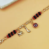 Gold-Tone Chain Bracelet with Red and Black Beads, Elephant Charm, Feather Pendant, and Round Stone Accent – 19 cm Length - Side View