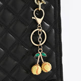 2 Pcs Yellow baseball shape Creative Sports Ball Cherry Keychain – Cute Resin Charm for Car Keys, Bags & Backpacks - 45-Degree Angle