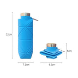 Blue 700ml Collapsible Silicone Water Bottle with Diamond Pattern - Food-Grade Portable Sports Bottle for Hiking, Camping, Travel & Gym - Leak-Proof Foldable Design with Carabiner Clip - Top-Down View
