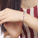 Heart-to-Heart Silver Plated Bracelet with Sparkling Rhinestones Elegant Romantic Jewelry for Women Includes Local Standard Gift Box for Special Occasions(Heart Brand) - Side View