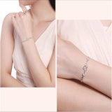 Heart-to-Heart Silver Plated Bracelet with Sparkling Rhinestones Elegant Romantic Jewelry for Women Includes Local Standard Gift Box for Special Occasions(Heart Brand) - 45-Degree Angle
