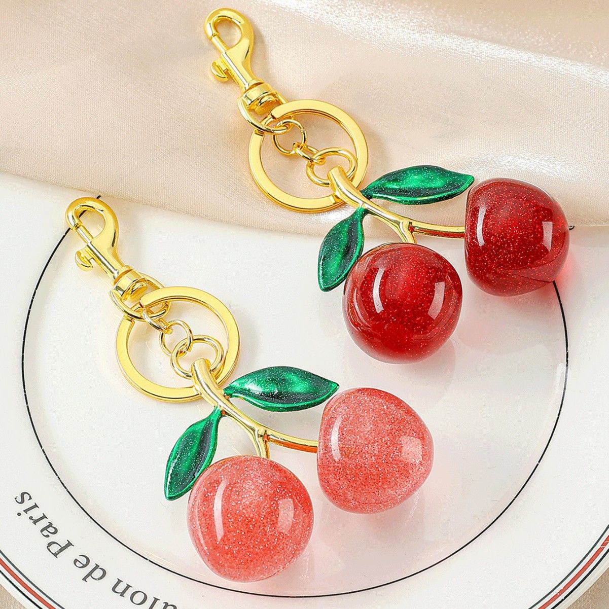 Golden Fashionable Cherry Keychain with Fruit Pendant for Handbags and Keys Stylish Accessory Solution for Local Trendsetters