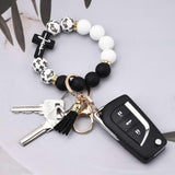 Black and White Silicone Bead Keychain with Cross Charm, Rhinestone Ring &short  Tassel - Religious Silicone Beaded Key Ring, Lightweight & Durable - Side View