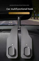 2-piece Brown and Grey ABS Dual-Hook Car Seat Back Hanger — Foldable, Faux-Suede Headrest Hook; The ideal companion for hanging handbags and shopping bags, also doubles as a mobile phone holder