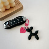 2-Piece Black Balloon Dog Keychain Set with Heart Charm Bag Pendant Cute Couple Gift