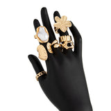 7-Piece Gold Liquid Lava Flower Stacking Open Rings Set with Imitation Pearls & Geometric Dripping Oil - Hollow Joint Knuckle Ring for Women