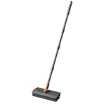 Grey V-shaped floor scrub brush with 360 degree rotating head and long handle