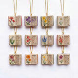 Vintage-style book necklace with February birthday flowers, a luxurious gold-plated bronze exquisite floral pendant gift - Close-Up Angle