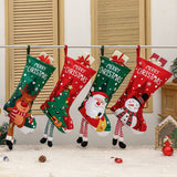 Christmas Reindeer Hanging Stocking - Festive Green Christmas Reindeer Design Hanging Sock with Dangling Legs Plush Holiday Fireplace Tree Decoration Gift Storage Bag for Home Seasonal Decor - Top-Down View