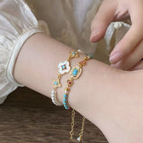 2PCS Vintage Layered Pearl Bracelet Set | Elegant Zircon Flower Charm Gold Plated Stackable Bracelets Jewelry Gift - Side View