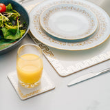 Clevinger Set of 4 MD Placemats Gold Border - Top-Down View