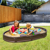 VEVOR Sandbox with Cover, 72 x 41.5 x 9.1 in Oval Sand Box, HDPE Sand Pit with 4 Corner Seating and Bottom Liner, Kids Sandbox for Outdoor Backyard, Beach, Park, Gift for Boys Girls Ages 3-12, Brown - Low Angle