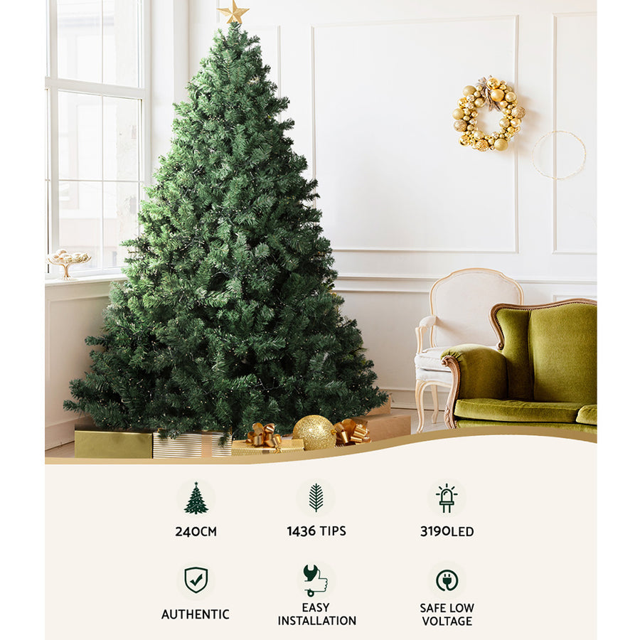 Jingle Jollys 2.4M pre-lit Christmas tree with warm white LED lights, bushy PVC tips