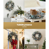 Delightful 60cm LED Christmas Wreath with Snowy Garland and Ornaments - 45-Degree Angle